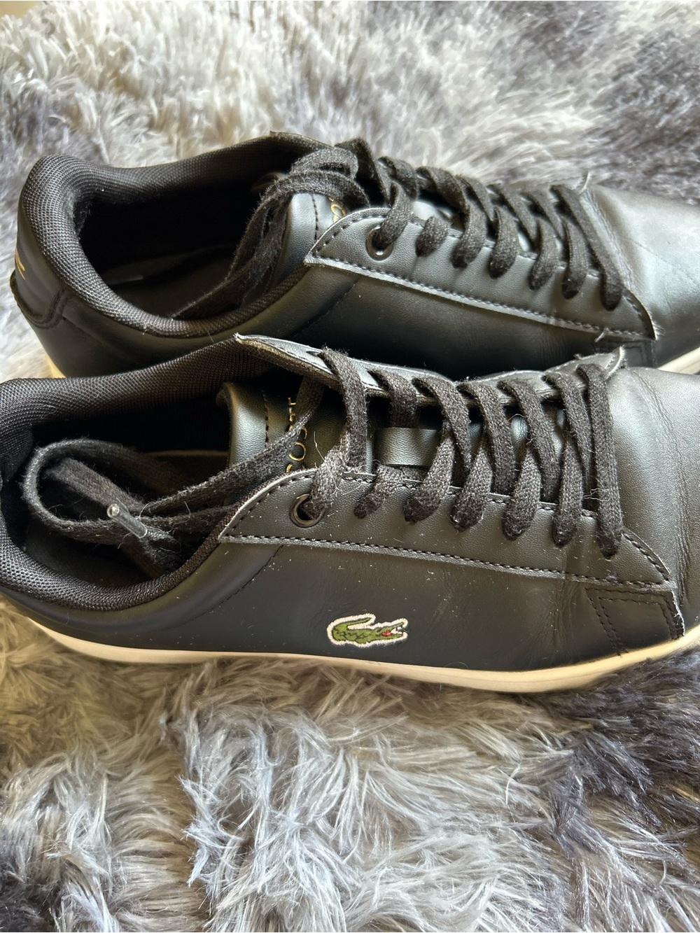 Black Lacoste leather sneakers